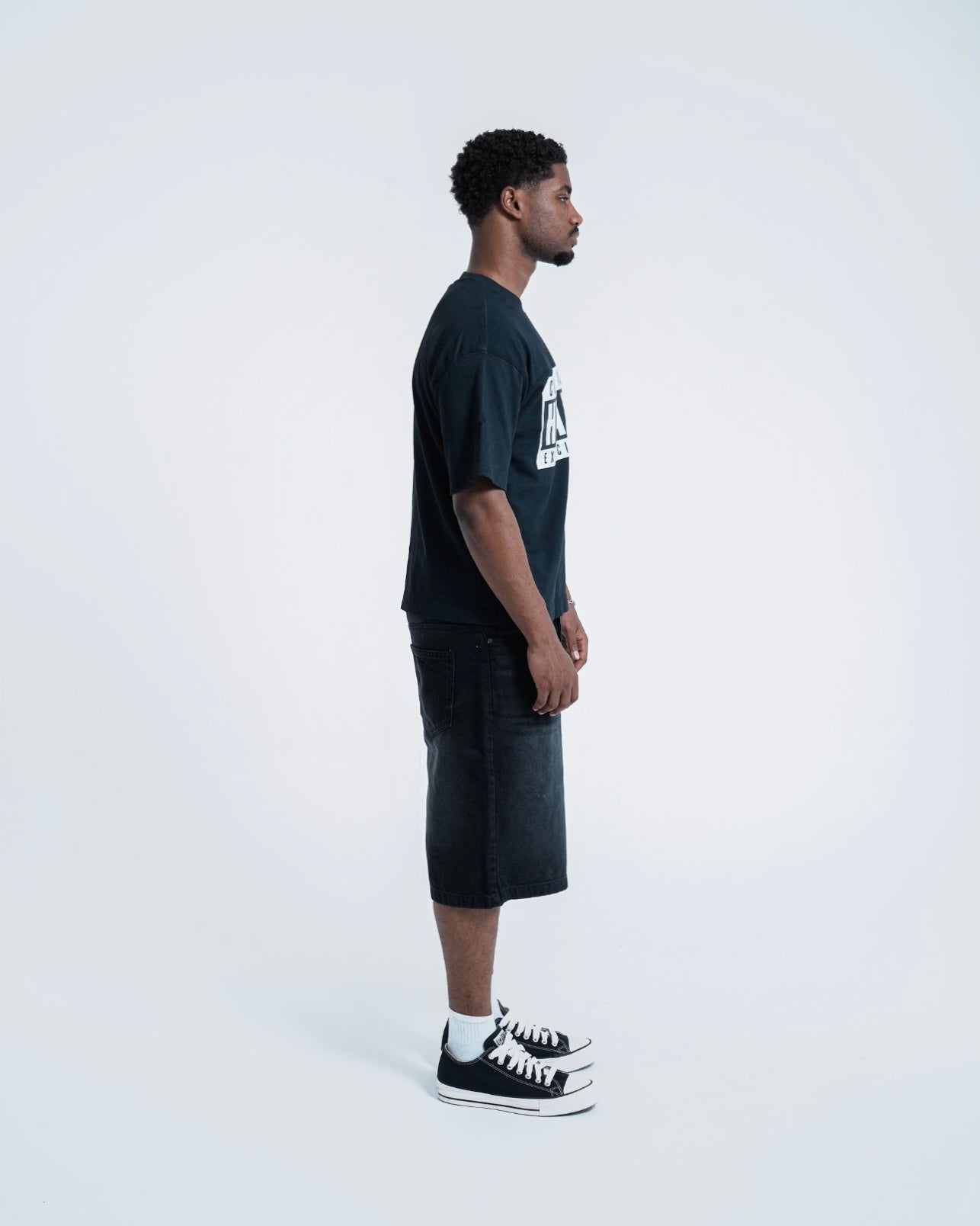 Model view of Conflicted Hearts Fractured Graphic Jet Black T-Shirt